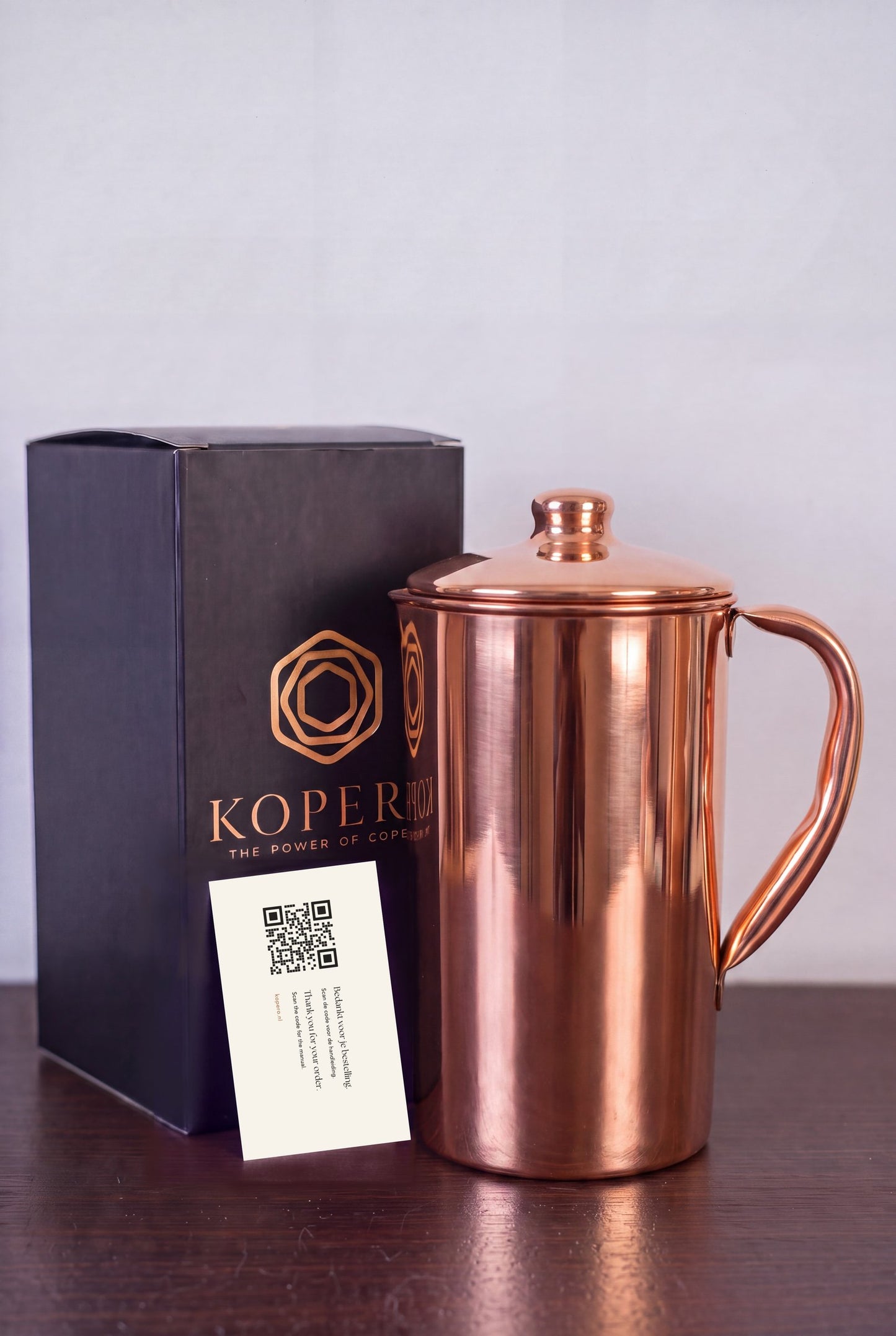 Kopero Kopparkanna Slät med den svarta presentasken och takkortet